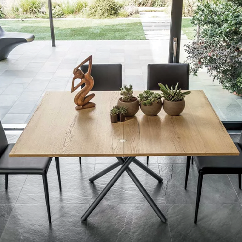 Lotus transforming table fully expanded to seat people