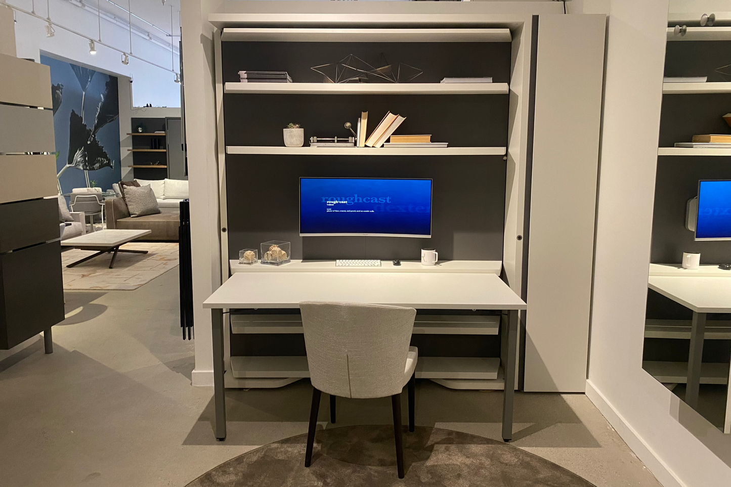 Wall bed with bookshelves and desk attached