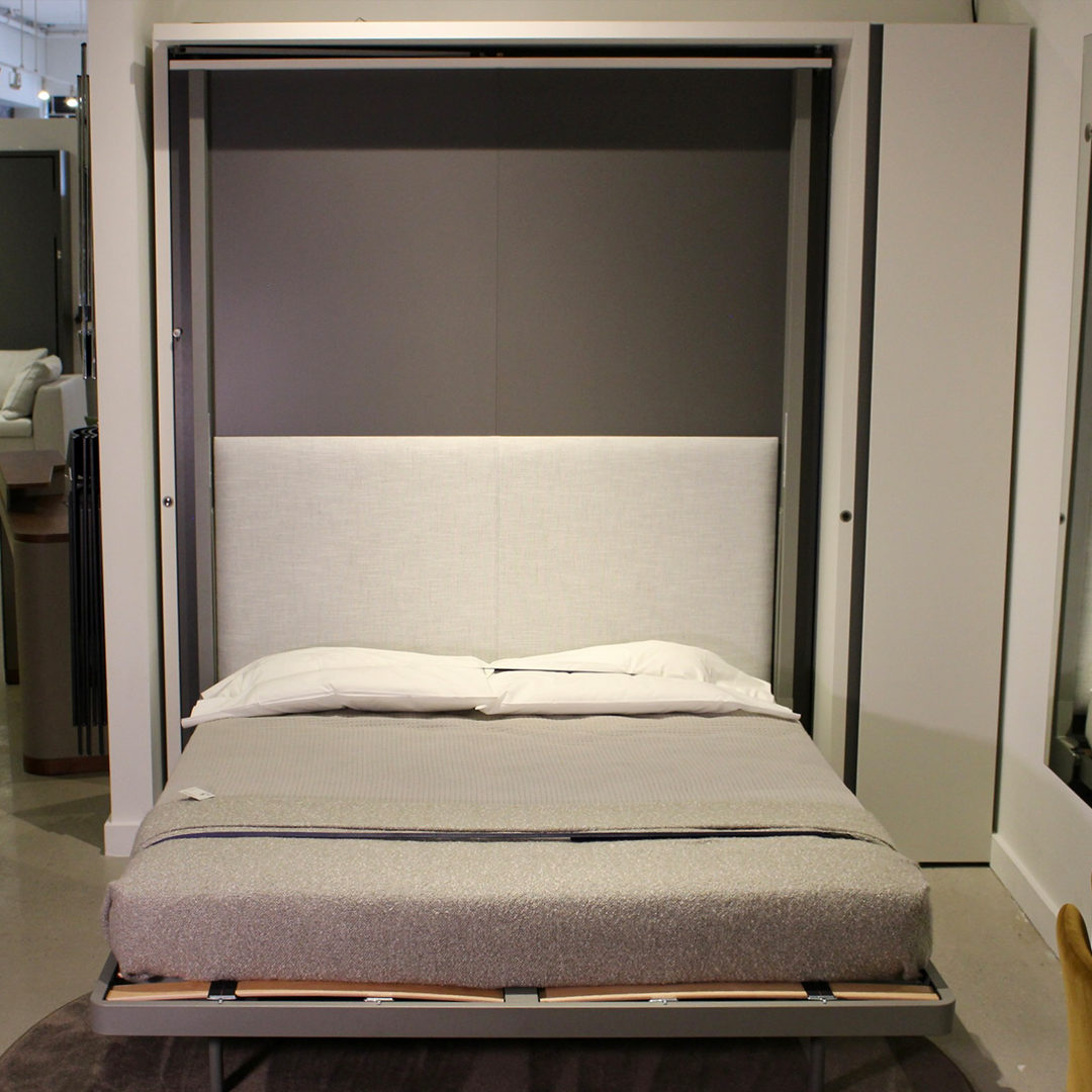 Wall bed open showing queen sized bed