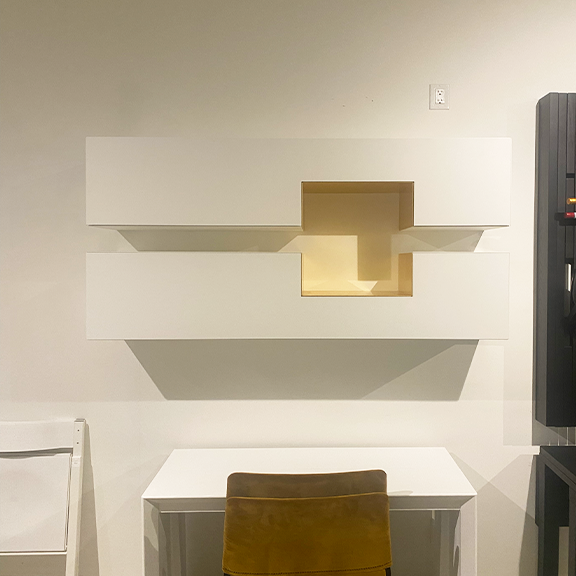 White and gold wall mounted cabinets