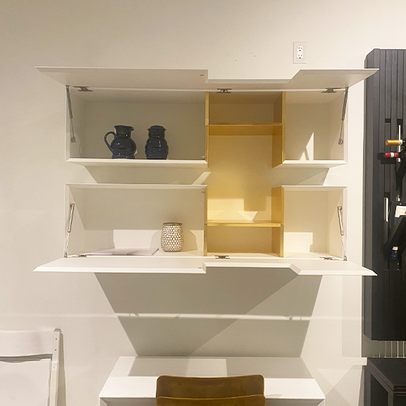 Wall mounted cabinets open