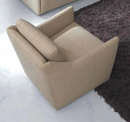 Small footprint armchair with low back.