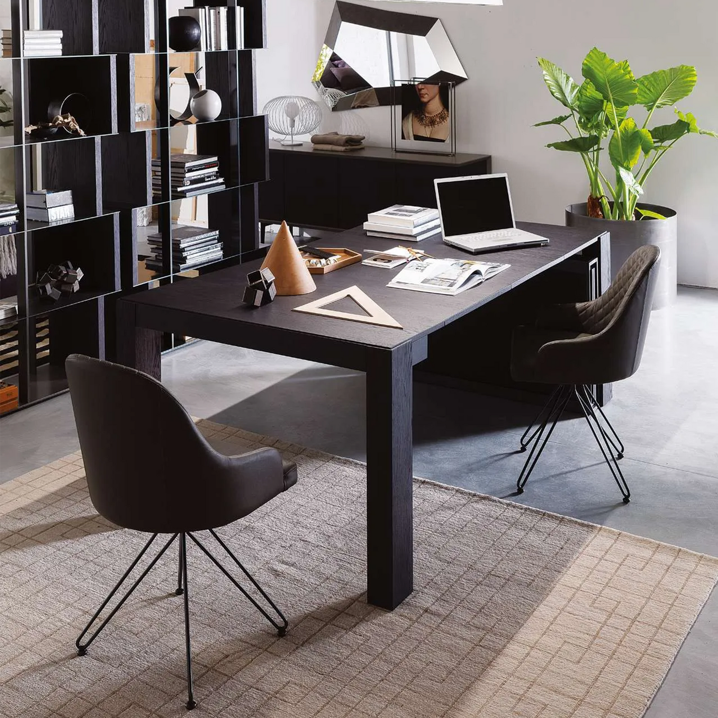 Wood console table expanded, used as a workstation.