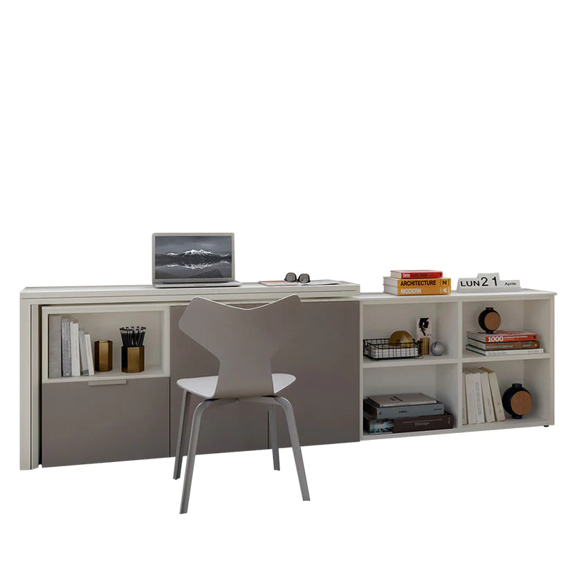 Table folded away, sitting over storage unit. Flush to wall.