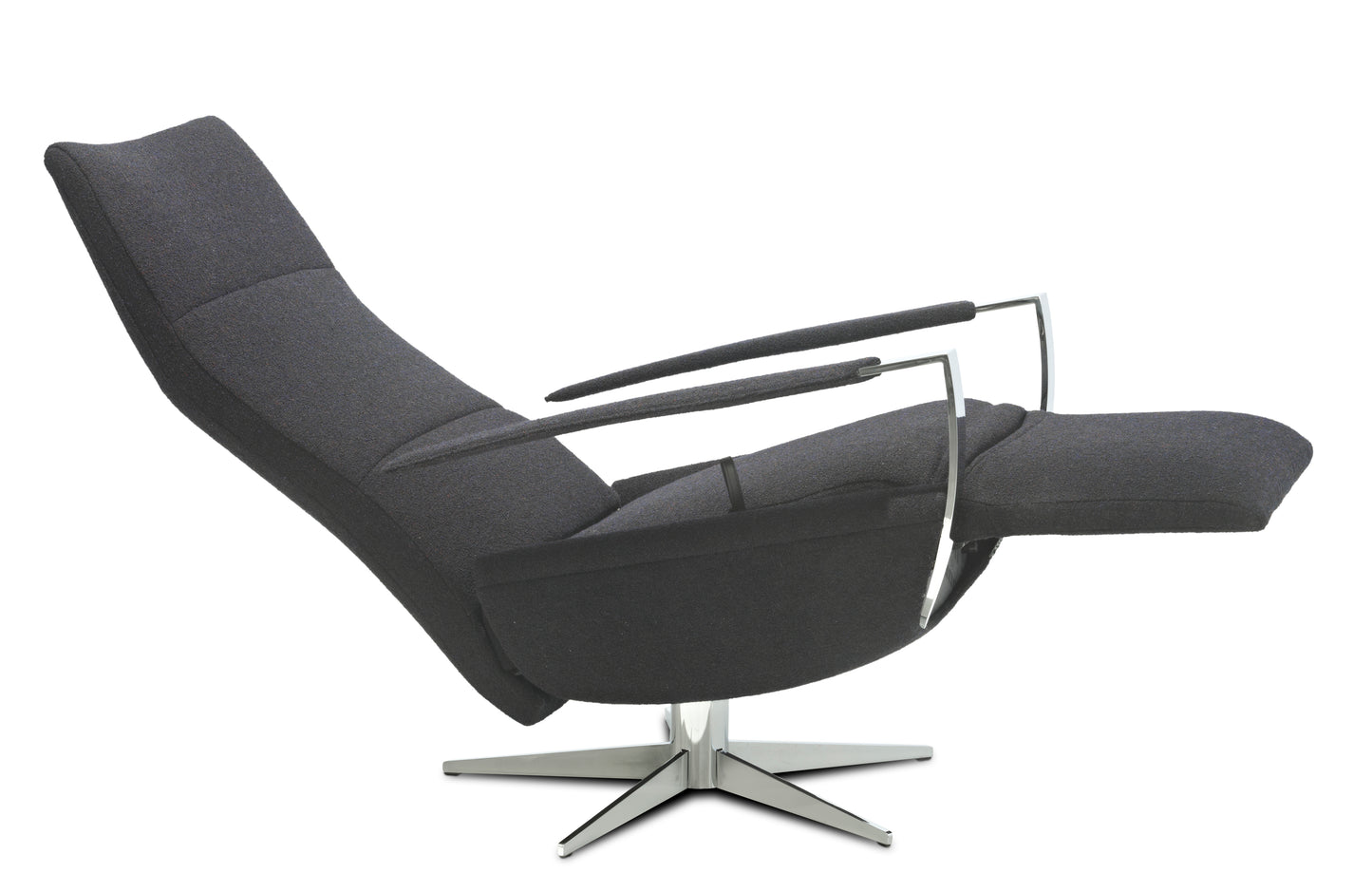 Leather recliner in relaxing position, backrest down and footrest up.