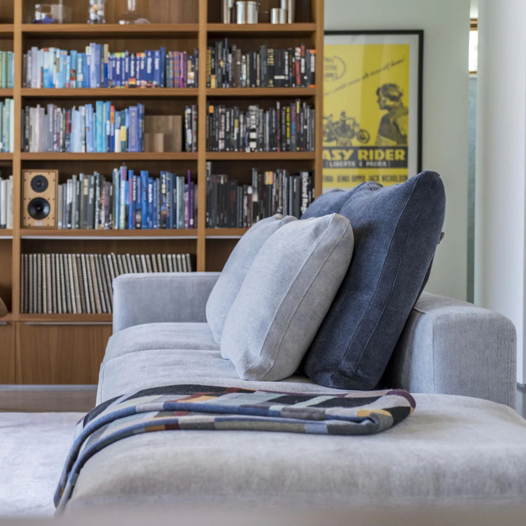 Sectional sofa with chaise and big cushions.