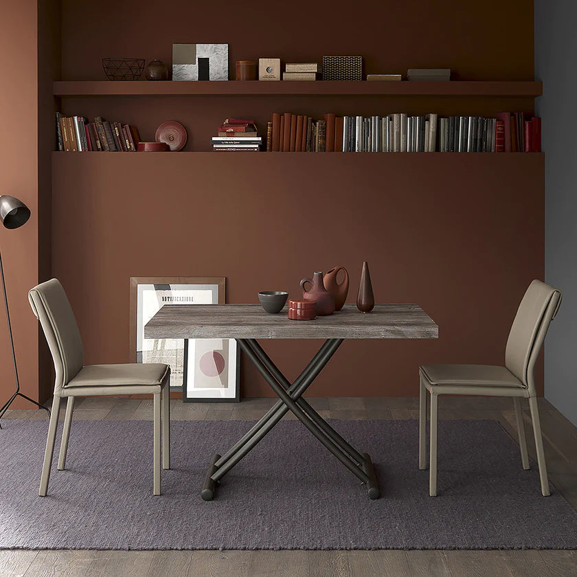 Genie transforming table at dining height.