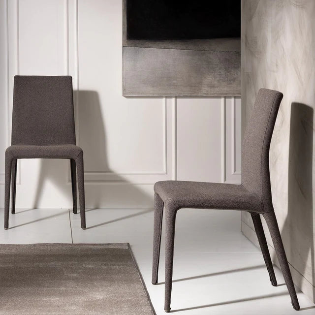 Dining chair finished in all leather.