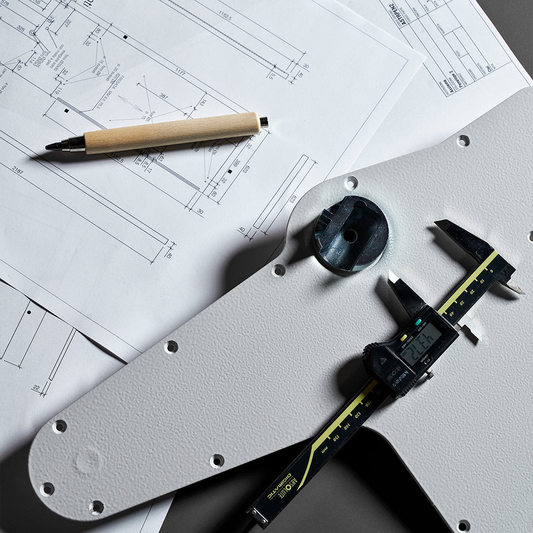 Close up of technical drawings and measuring tools