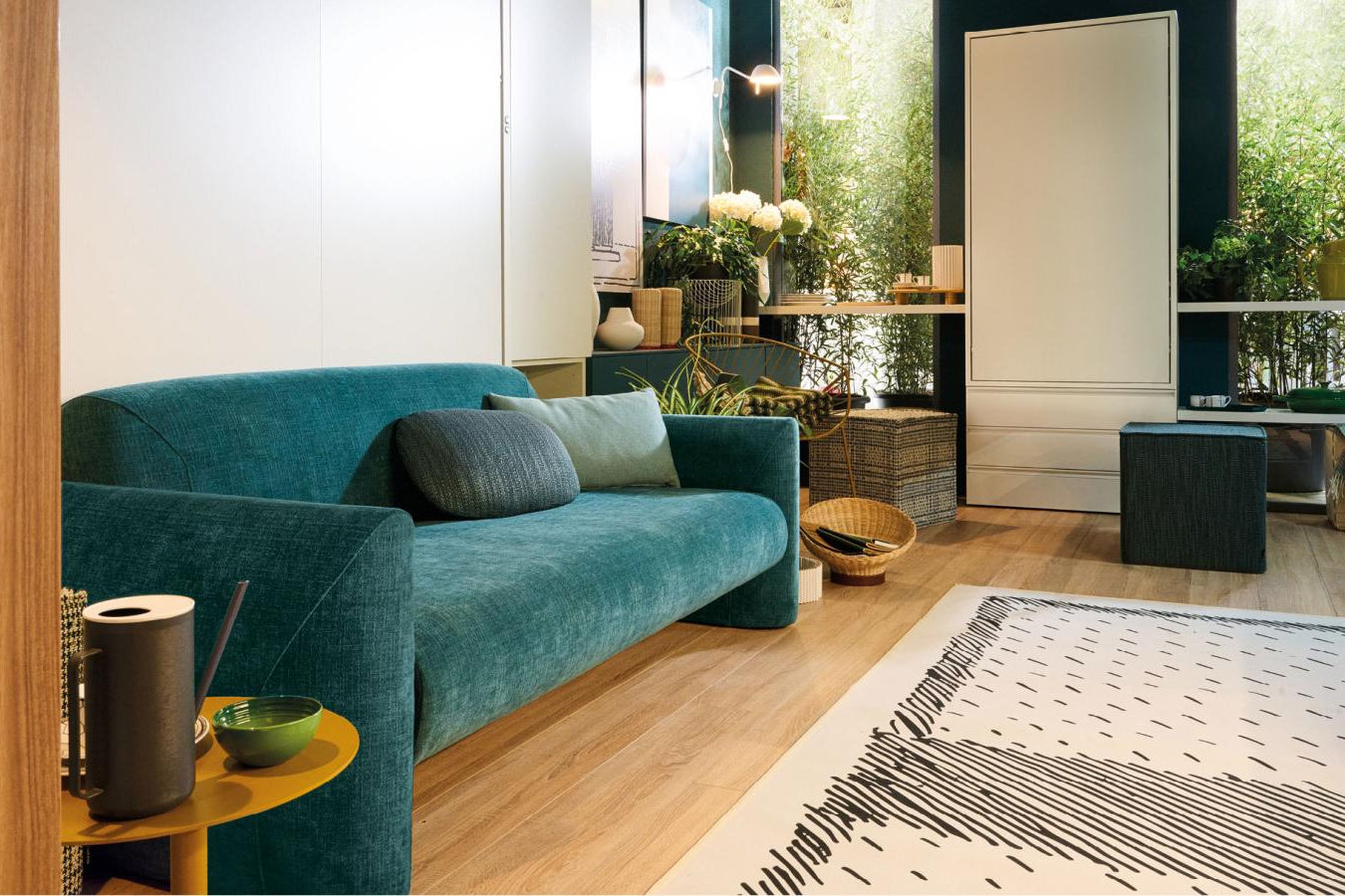 Close up of green velvet on sofa wall bed
