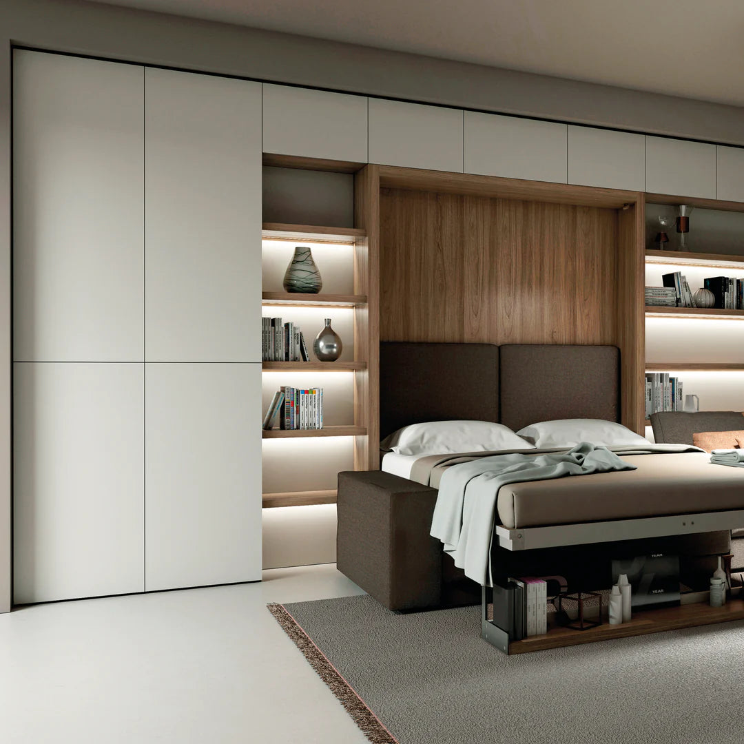 Full height contemporary storage cabinets surrounding Murphy bed with sofa