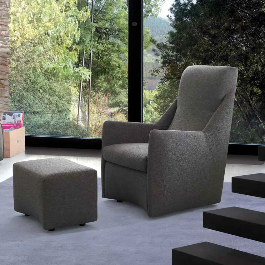 Small footprint armchair with ottoman.