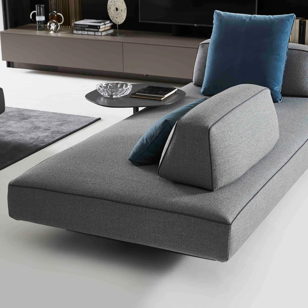 Airy looking sofa with movable backrests.