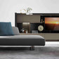 Modular sofa with sculptural leg and airy appearance.