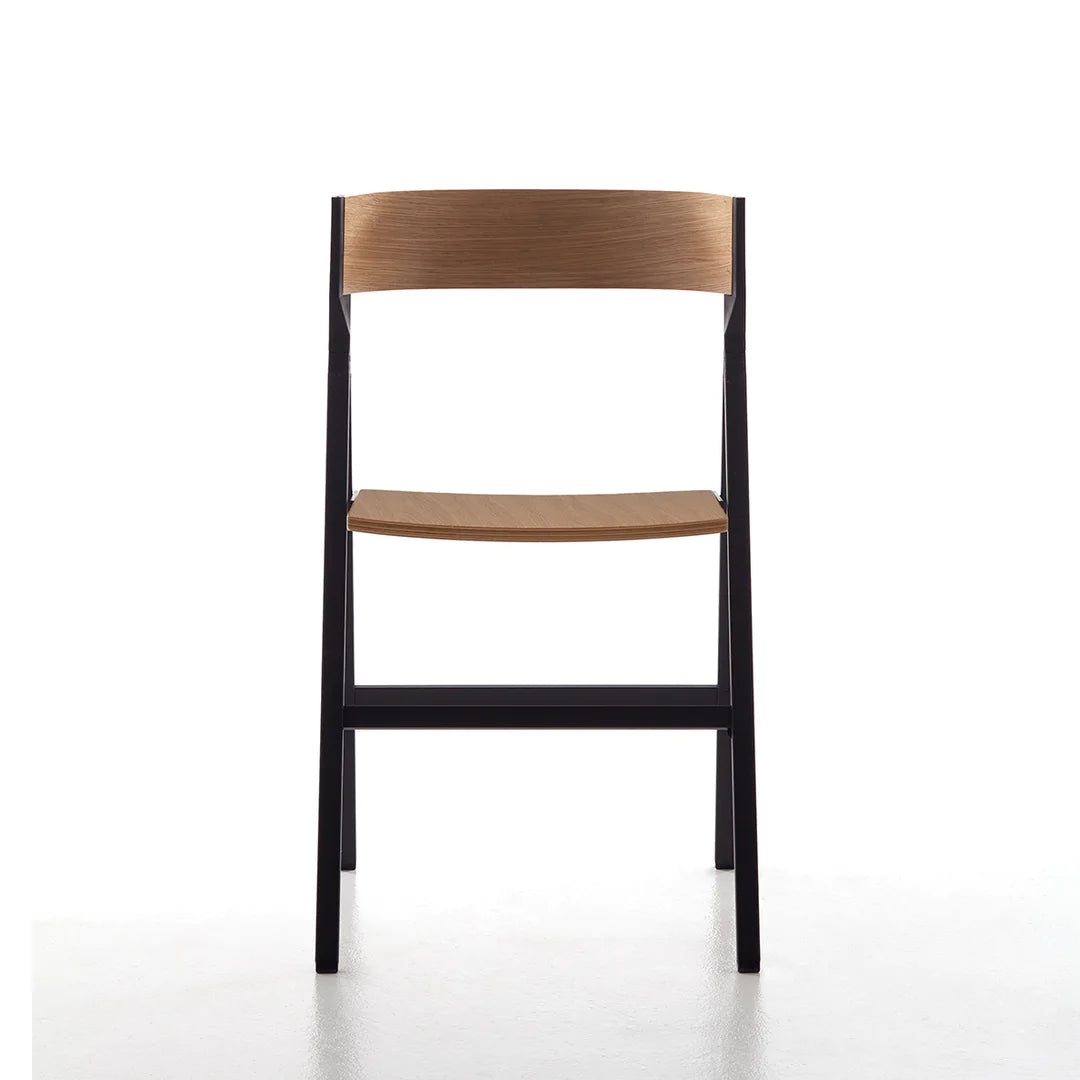 Folding dining chair with curved back, wooden seat and metal frame.