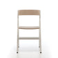 Folding dining chair with curved back. Light wood seat, white frame.
