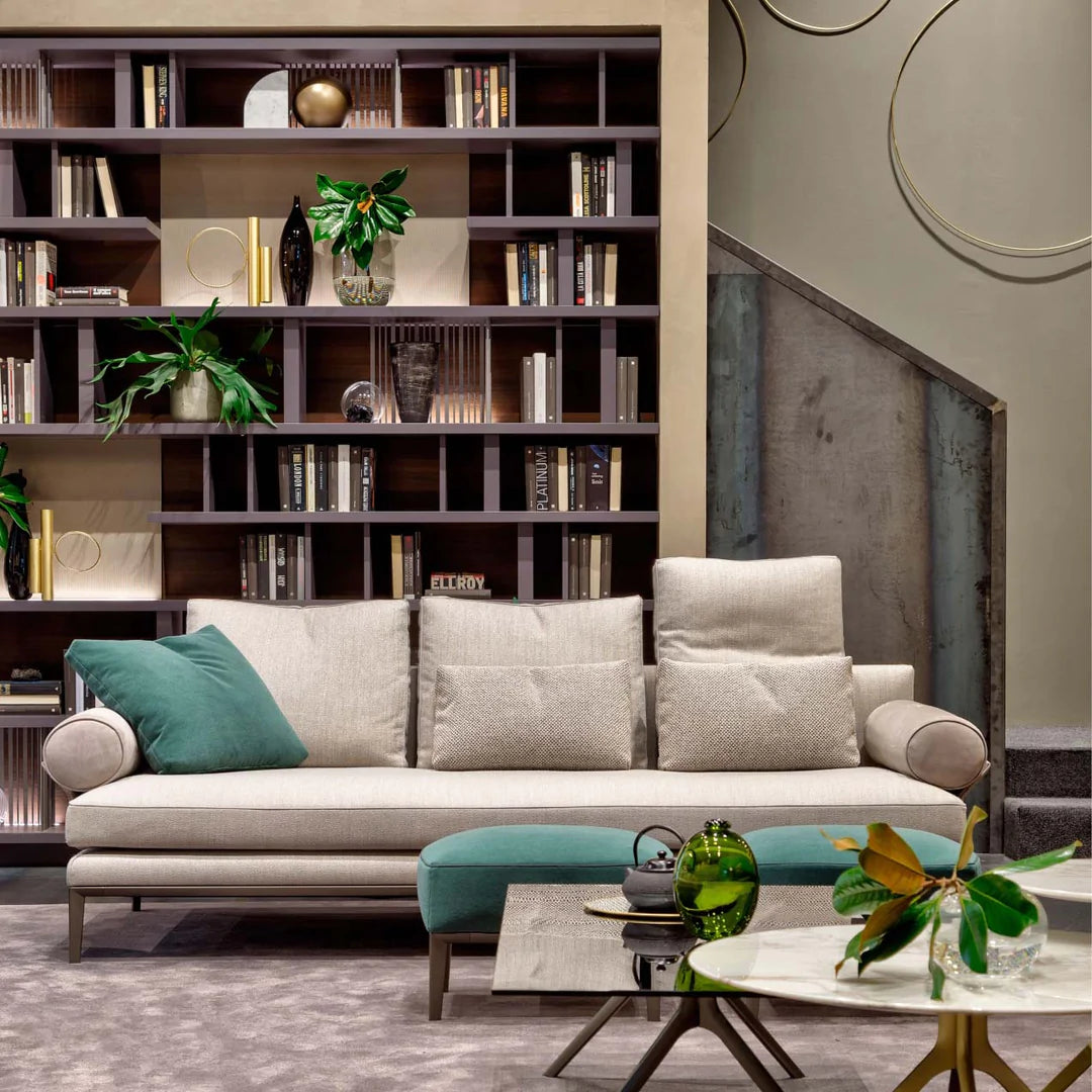 Byron sectional sofa in living room setting with bookcase.