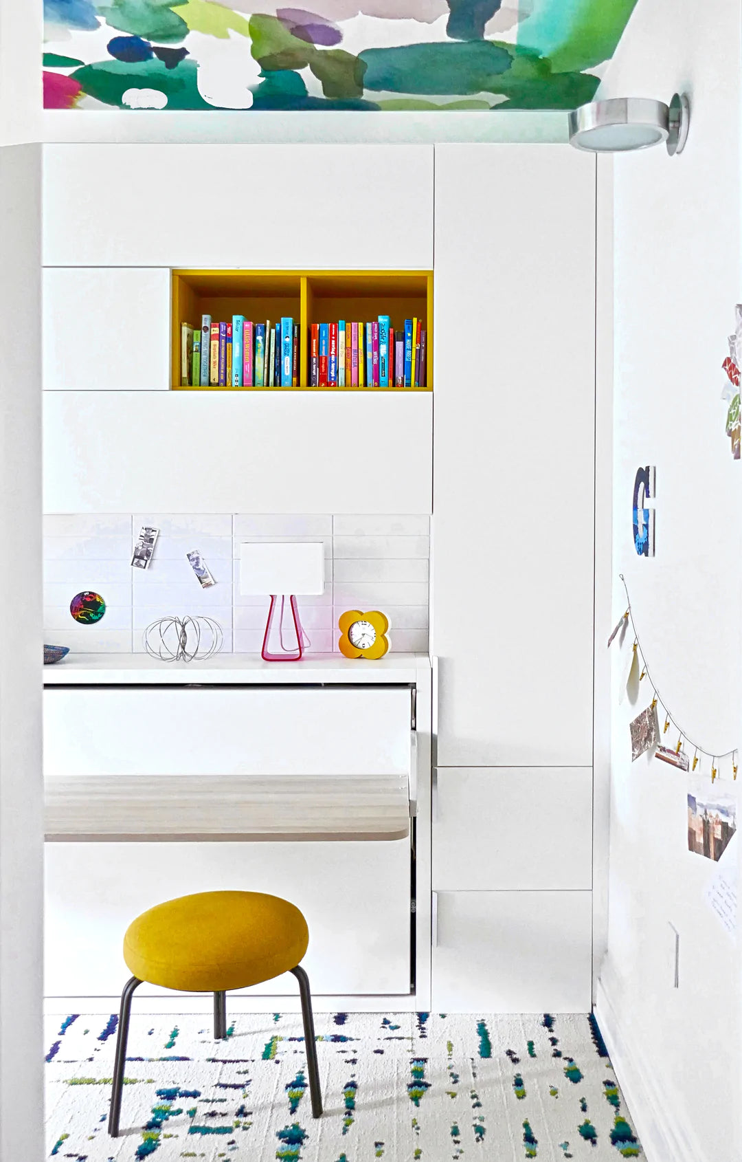 Floor to ceiling cabinet with three compartments.