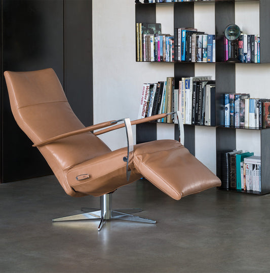 Leather recliner with armrests.