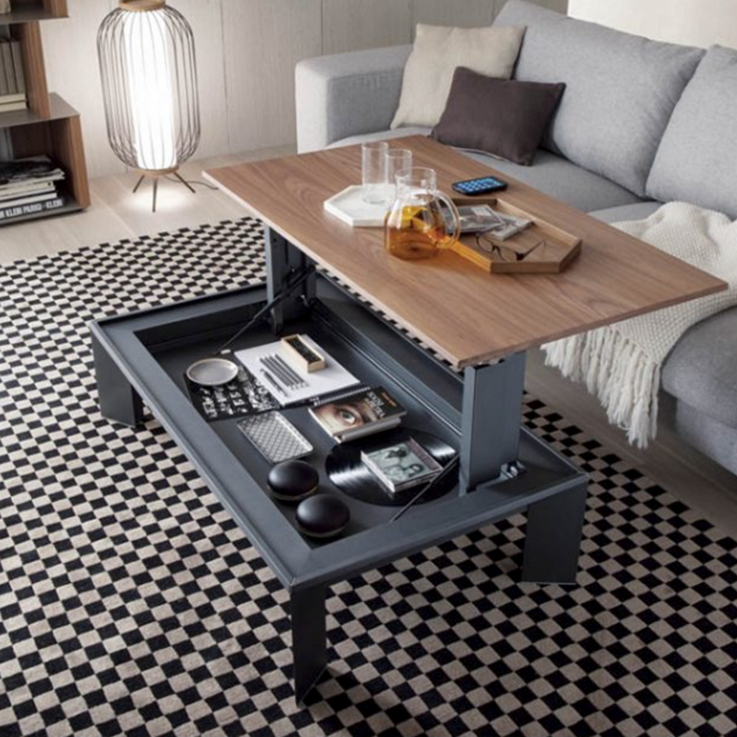 Metrino coffee table with top lifting up towards sofa.