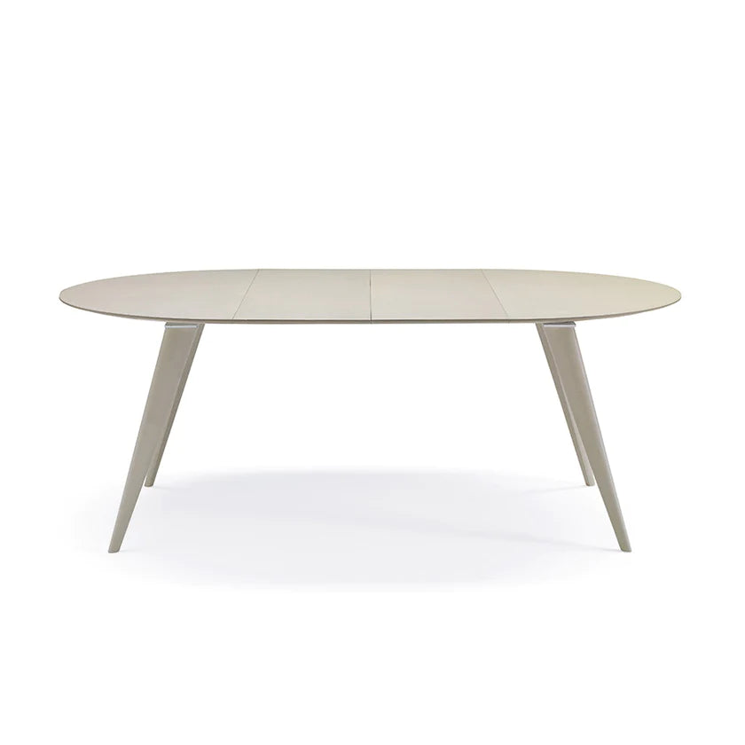 Round extendable dining table. expanded to accommodate 6.