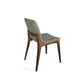 Armless dining chair with wooden base and grey seat.