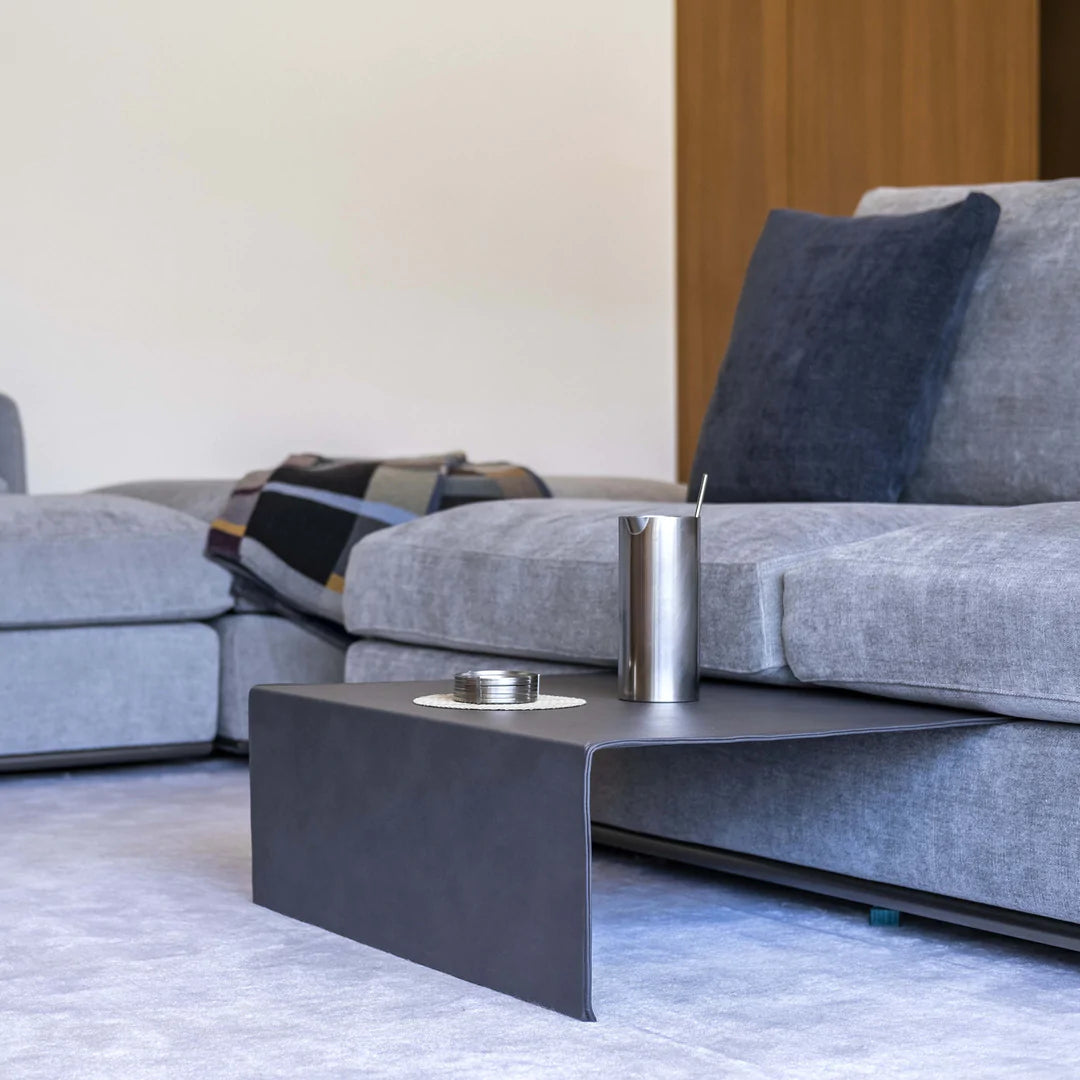 Sectional sofa with pull out coffee table.