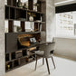 Shelving unit between two walls, with fold out desk open.