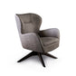 Upholstered armchair with swivel base and deep seat.