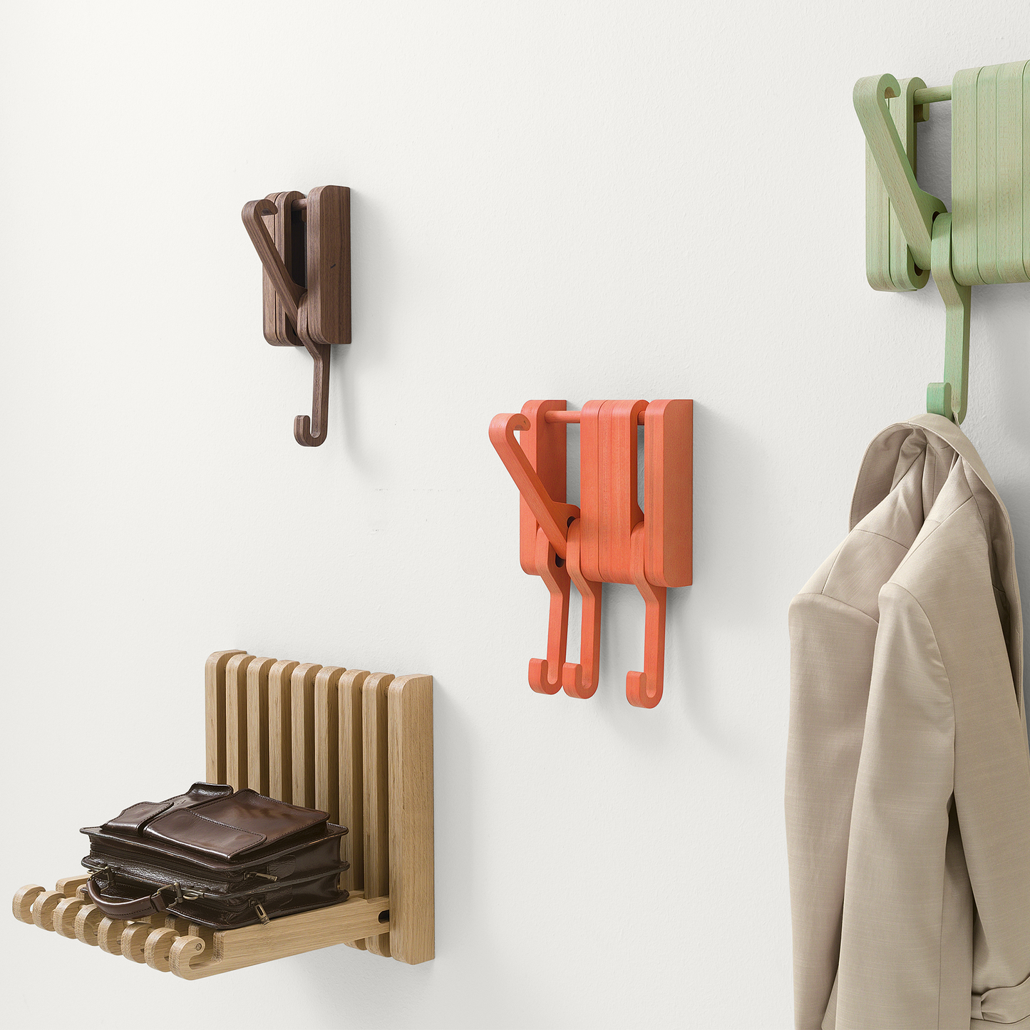Wooden wall hooks in use.