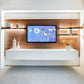 Smaller version of wall mounted media unit finished with Walnut back panels, gold shelves and white storage containers.