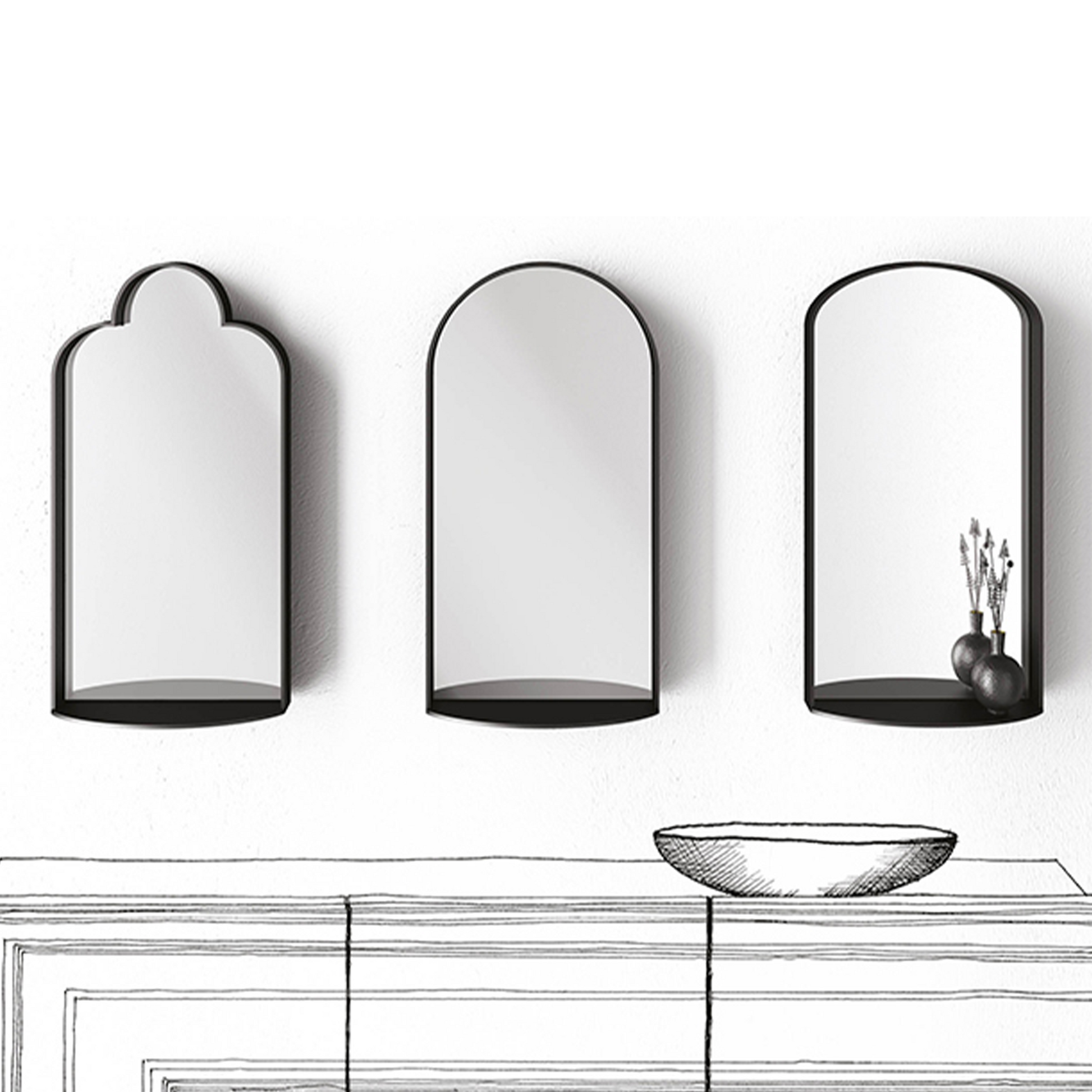 Mirrors hanging above an entryway console, resembling different shaped windows.