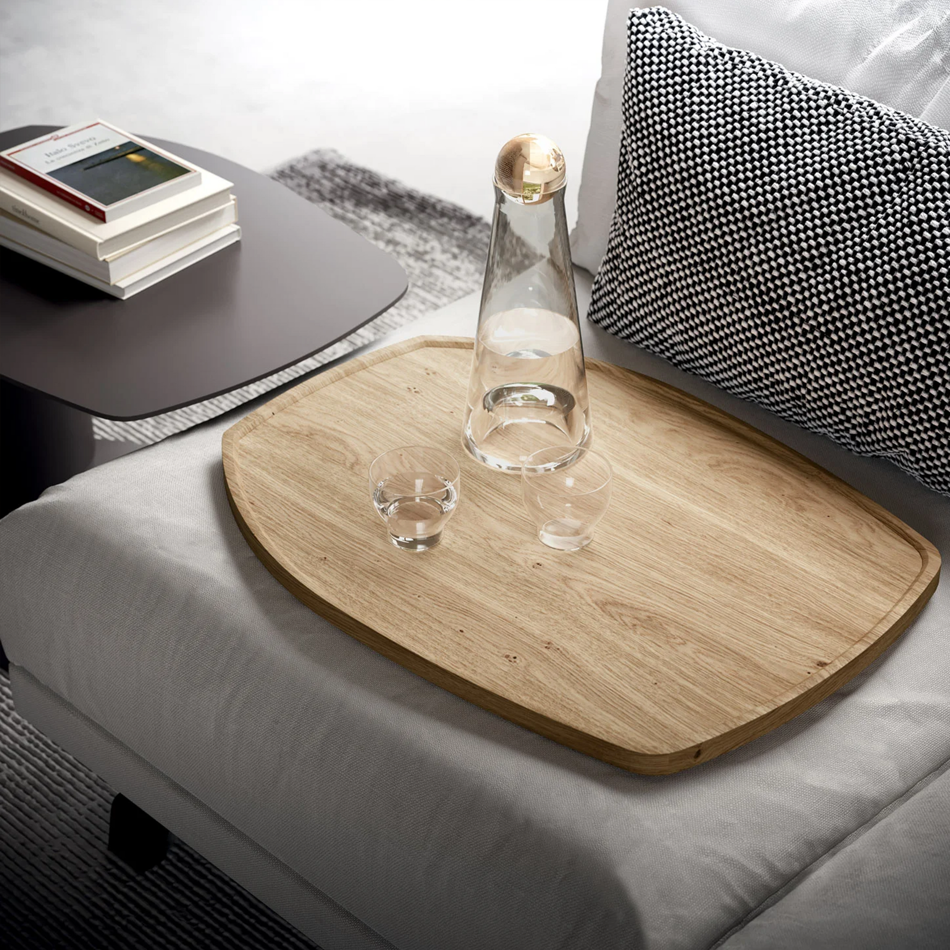 Zoom table with detachable oak tray on sofa seat.